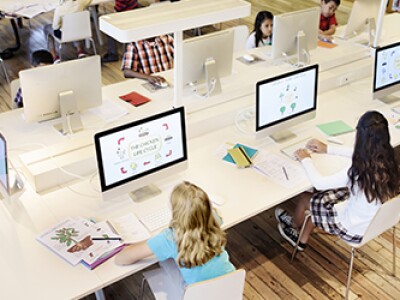 Five-kids-working-on-computer