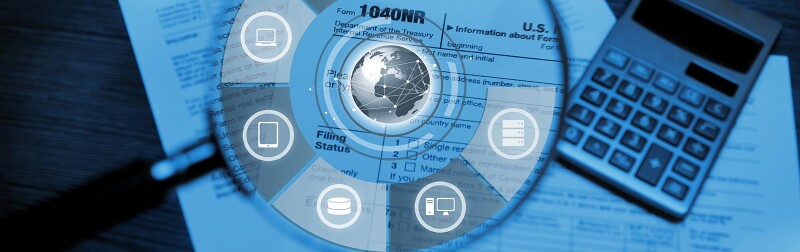 Magnifying glass depicting forensic accounting tasks