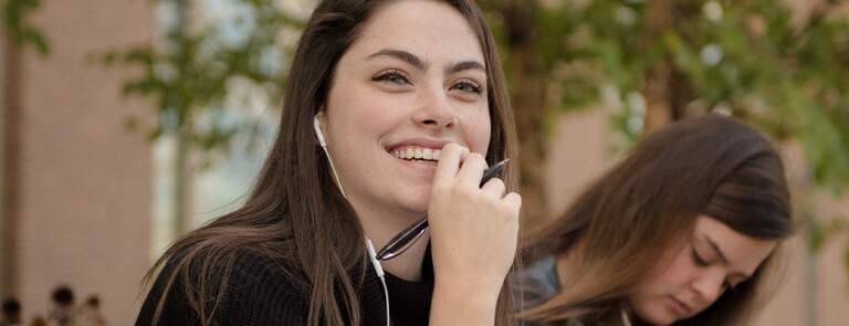 Happy-student-on-campus