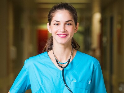 Nurse standing in a hospital corridor