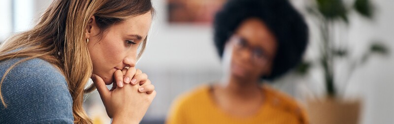 Therapist or healthcare professional with a client