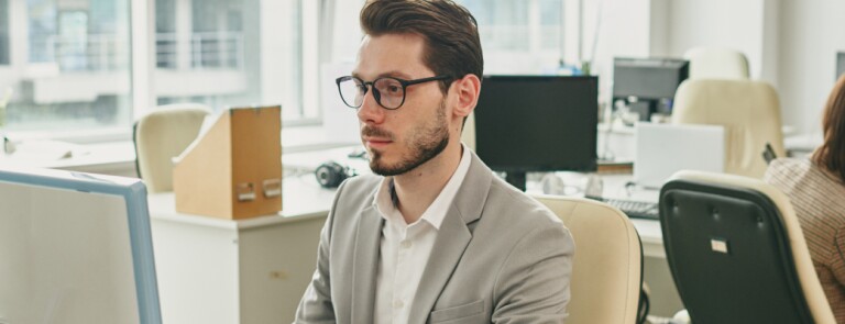 Professional works on computer in law office