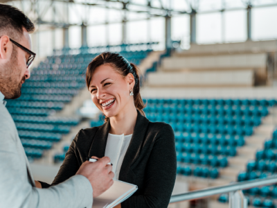 Facility-Director-With-Clipboard-In-Arena
