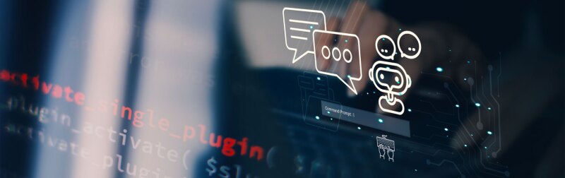 Computer programmer coding on laptop using AI Chat.