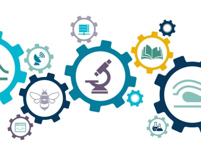 Illustration of cogs with various icons in the center.