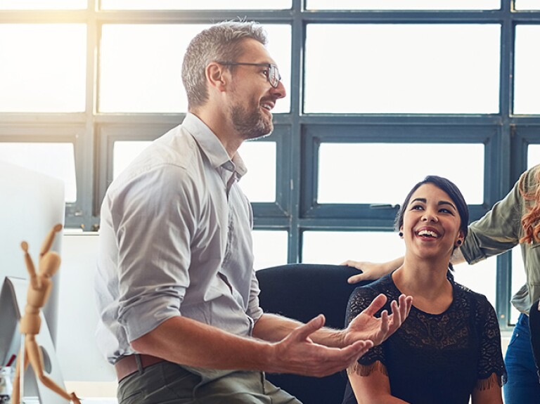 Team lead having a lively discussion in the office