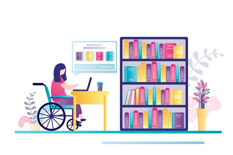 A student in a wheelchair using a laptop.