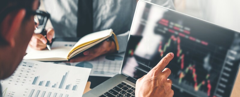 Business team discussing and analysis stock market