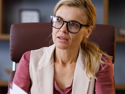 Female career counselor talking to young professional