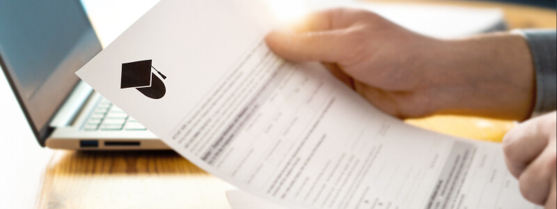 Man reading MPH tuition document from school, filling form and planning studies