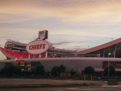 The sun sets behind the Kansas City Chiefs Stadium