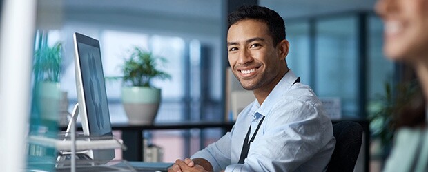 Google MBA intern in office working on computer