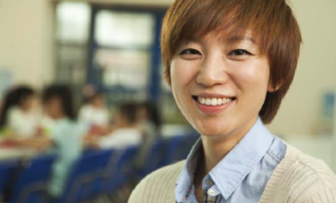 asian woman with short hair smiling