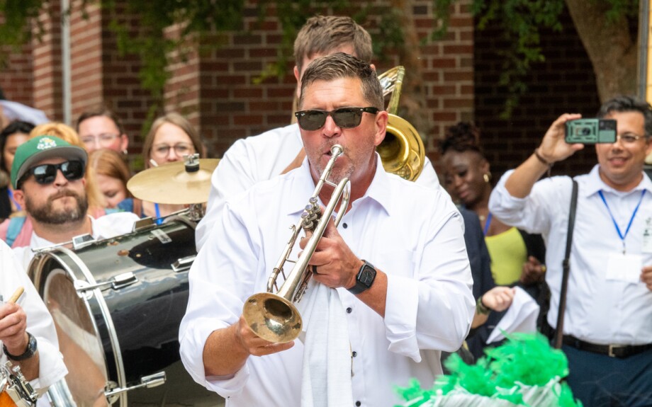Group of people playing instruments on street