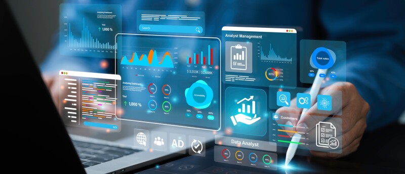 man on laptop with analytics