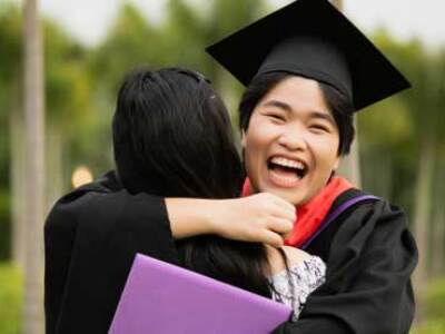 graduating-student-celebrating-with-a-hug