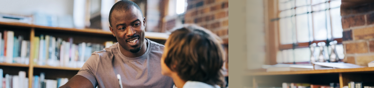 School counselor speaking with young student