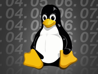 The Linux penquin mascot Tux centered with the numbers 1 through 10 repeated in the background