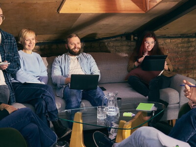 Leaders of a nonprofit enjoy a collaborative meeting
