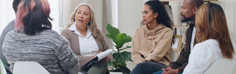 Counseling, group and psychology discussion with group of diversity people in therapy for depression, stress and anxiety.