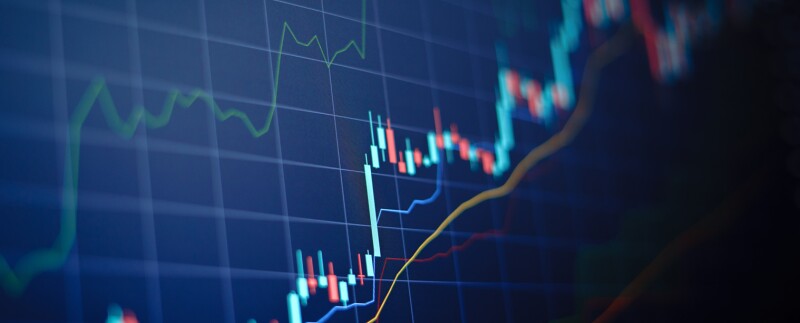 Closeup data chart with uptrend line candlestick graph