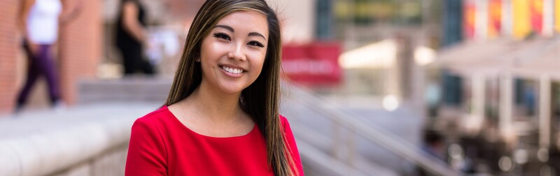 Young woman outside on a school campus