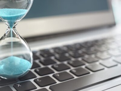 Hourglass running on laptop keyboard