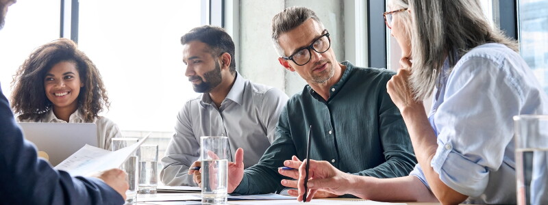 Colleagues work collaboratively in a meeting