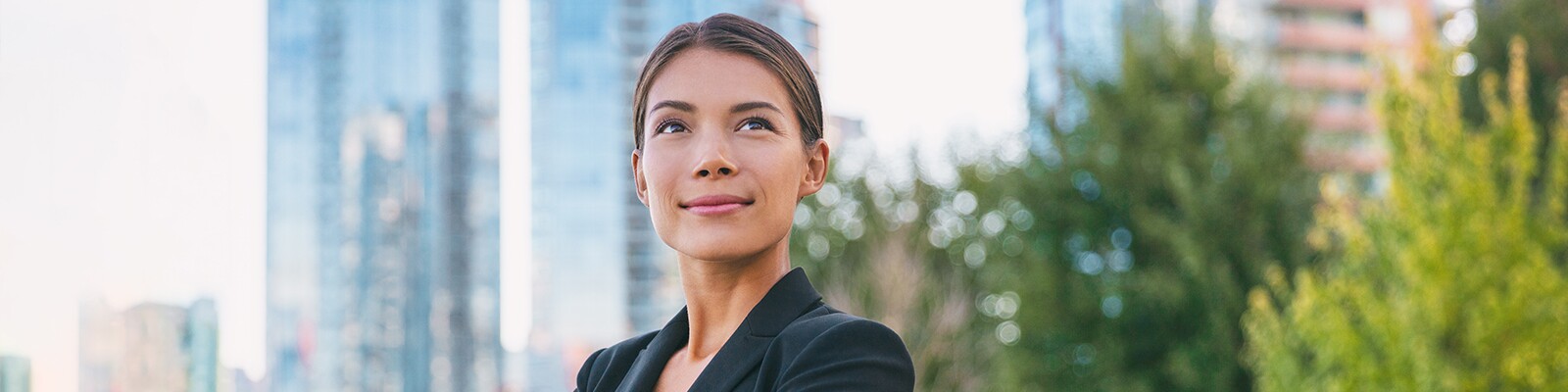 Happy-Businesswoman-Smiling-Outside