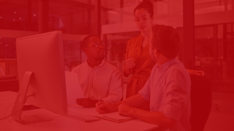 Woman speaking to two employees