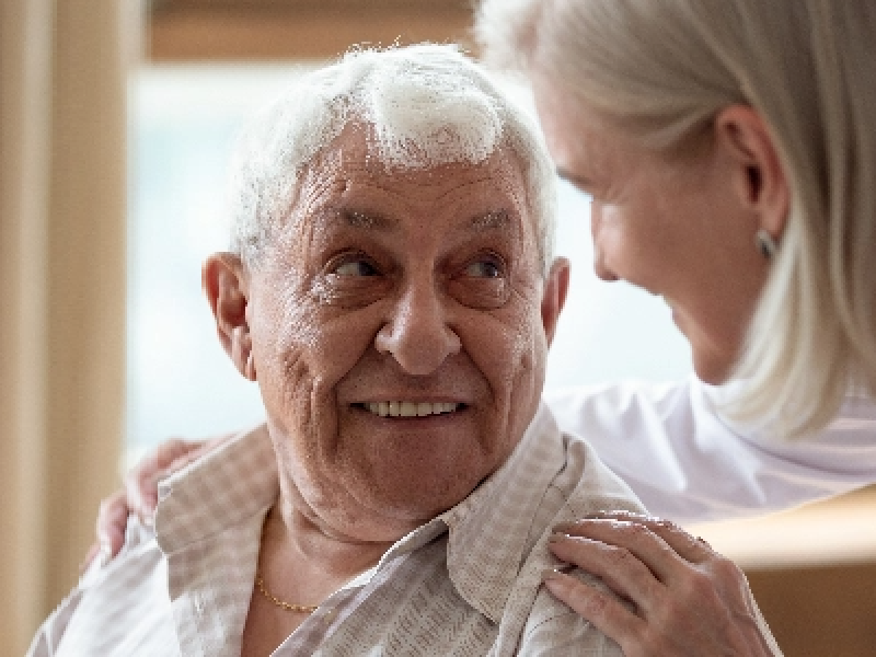 Older man working with social worker