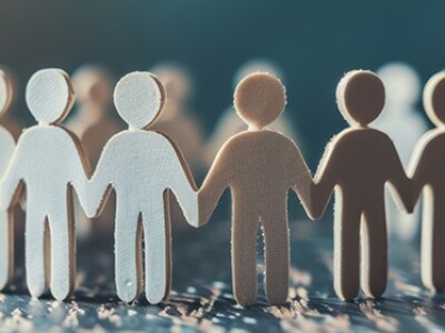 A group of figures holding hands