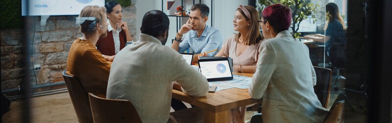 Digital Marketing Team Meeting in the Modern Office Conference Room