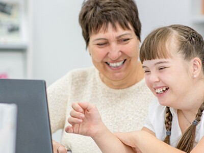 teacher-helping-special-needs-student