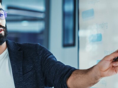 Finance Manager Holds A Budget Meeting Presentation To Review Financial Analytics.