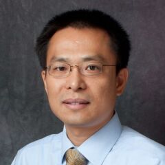 George (Gangshu) Cai