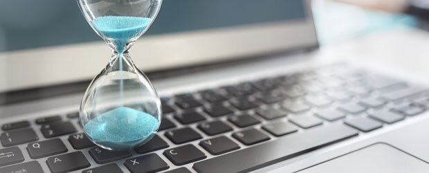 Hourglass running on laptop keyboard