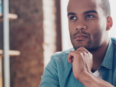 Man is making decision sitting at the office