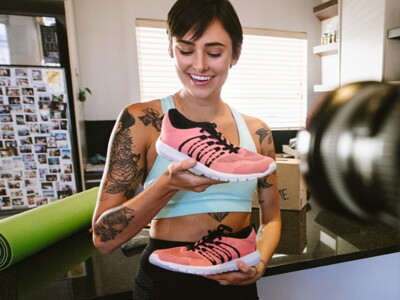 Influencer recording running shoe review