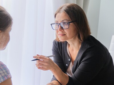 woman-counselor-talking-to-young-girl.jpg