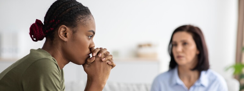 A veteran talks with an attentive counselor