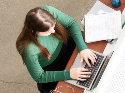 Female student working on her laptop