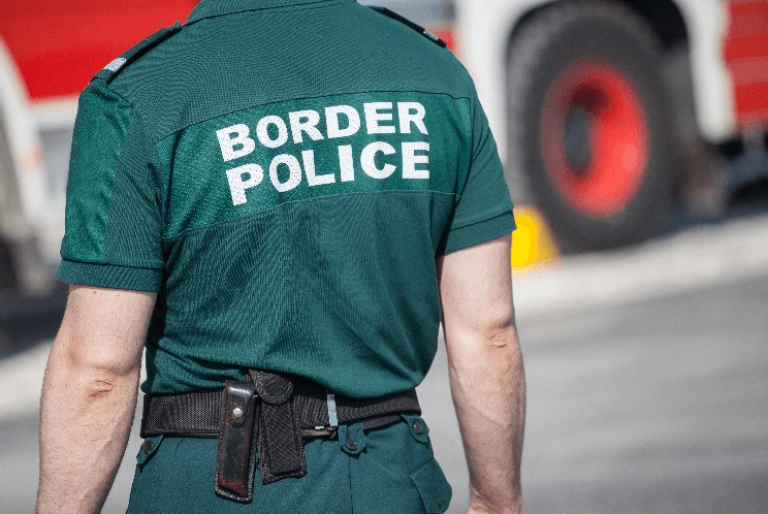 Back of border police agent in the line of duty