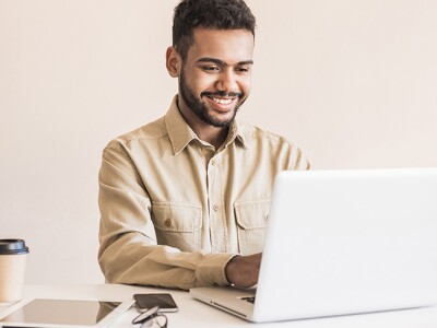 Man using laptop in office