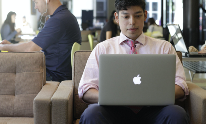 student working on a laptop