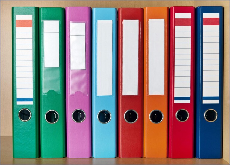 A row of colorful binders