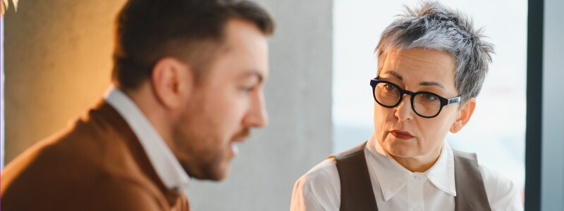 A counselor listens attentively to her client.