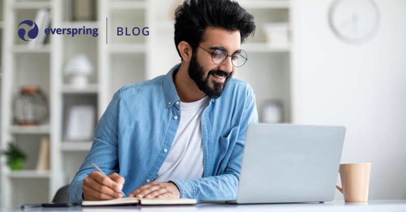 Man Working Online With Laptop At Home Office