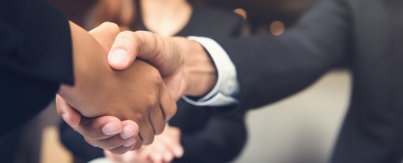 Businessmen shaking hands after a meeting