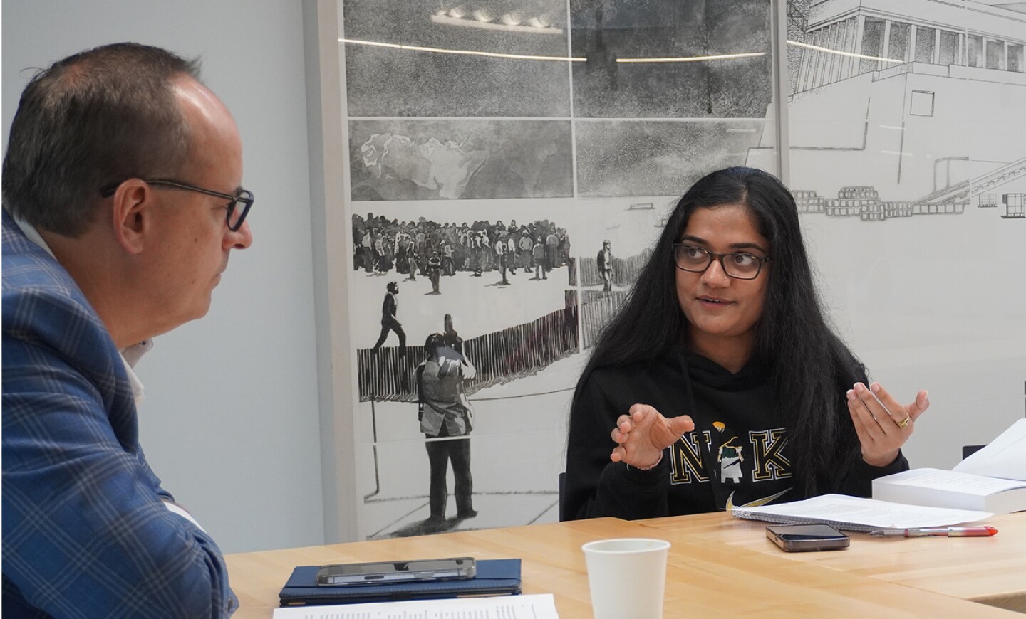Kent State faculty member and student having a conversation